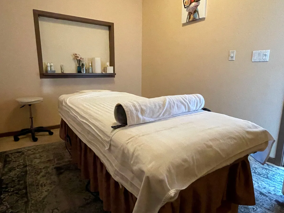 A quiet treatment room at Butterfly Day Spa, with a prepared massage table